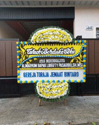 Papan Bunga Duka di Molagalome
